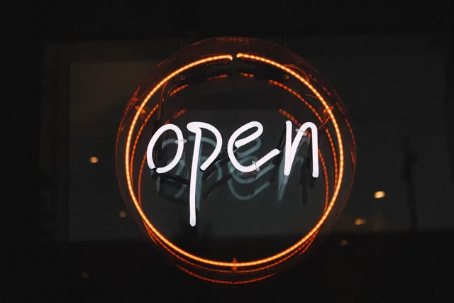 open, illuminated, light, neon light, sign, entry, neon sign, signage, open sign, open, open, open, open, open. Bilingual marketing for Cardiff firms: brief, tracking and who to ask for support